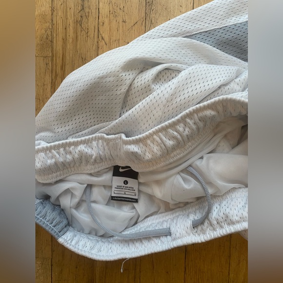 Nike size large white shorts with gray on the side. Size large. - Picture 3 of 3